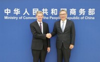 商务部部长王文涛会见美国维萨公司首席执行官麦凯恩